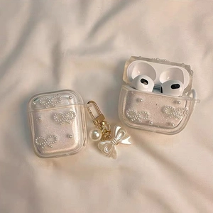 Funda AirPods 4 con purpurina y colgante de lazo de perlas con diseño brillante