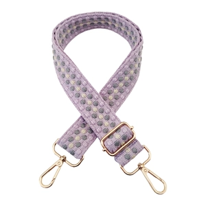 Adjustable woven lavender shoulder strap with polka dot pattern and gold metal hooks