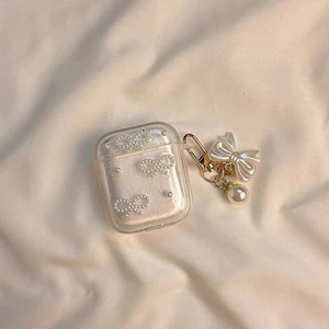 Funda AirPods con purpurina, lazos de perlas y llavero de lazo dorado elegante