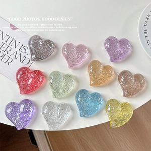 Set of 10 glitter heart resin grips for DIY phone stands in various vibrant colors
