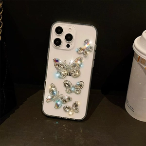IPhone case with five sparkling rhinestone 3D butterflies on transparent back cover