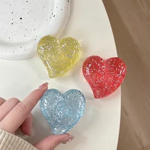 Transparent heart glitter phone grip stand in yellow, red and blue set for mobile support