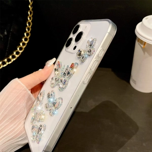 Luxury iPhone case with 3D rhinestone butterflies on creamy white back panel