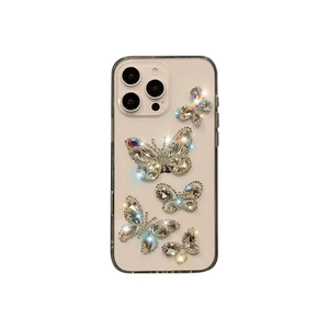 Clear iPhone case with sparkling rhinestone butterflies and colorful 3D crystal accents