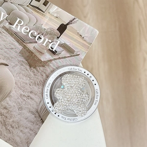Detail of bear shaped phone socket with crystals and Gift For You text design
