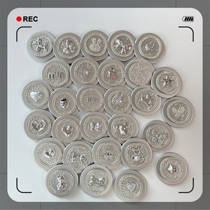 Detailed view of assorted silver magnetic MagSafe phone grips with cute Y2K patterns