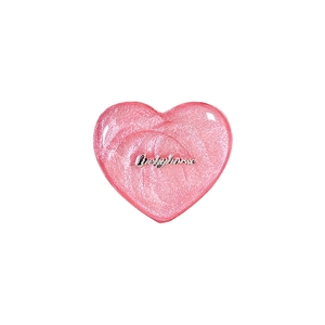 Pink heart-shaped MagSafe phone socket with glitter texture and silver logo