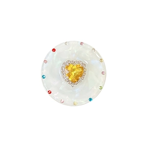 Magnetic rhinestone phone socket with heart gem and colorful crystals on white base