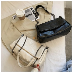 Chic quilted PU leather crossbody bags in black and beige with metal chain straps