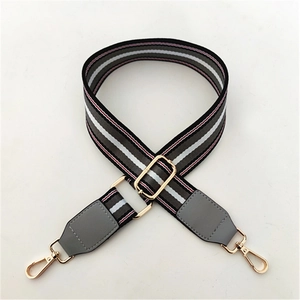 Adjustable wide striped shoulder strap with red accents and gold metal hooks for bags