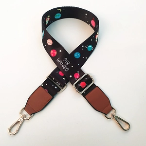 Adjustable planet pattern bag strap with Dream Big slogan and gold metal clips