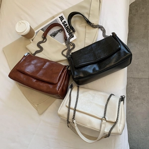 Retro PU leather chain crossbody bags in brown, black and white with quilted stitching