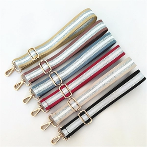 Adjustable woven shoulder straps in six colors with silver stripes and gold buckles