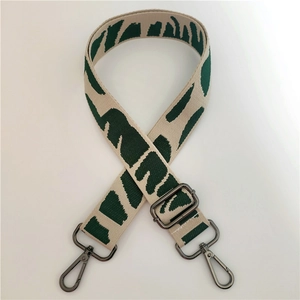 Adjustable wide canvas shoulder strap with green pattern and metal lobster clasps