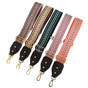 Ethnic style wide adjustable shoulder straps with colorful geometric patterns and gold clips