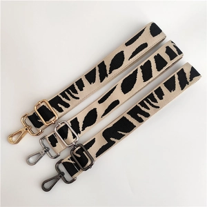 Adjustable wide replacement strap with zebra pattern and three metal hardware finishes