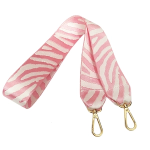 Bandoulière large à motif zébré rose et blanc avec crochets pivotants dorés