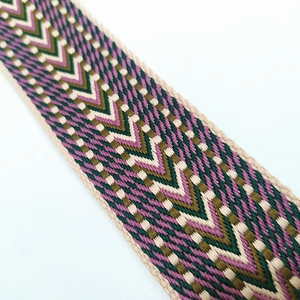 Close-up of wide cotton jacquard bag strap with colorful V-shape geometric weaving pattern