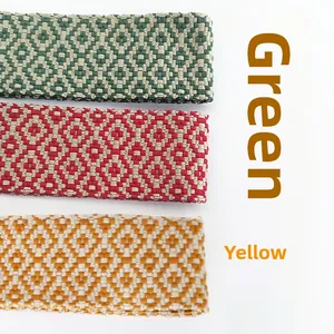 Detailed embroidery on adjustable wide straps in green, red, and yellow geometric patterns