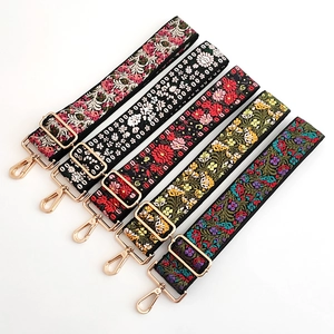 Five assorted ethnic jacquard embroidered adjustable shoulder straps with gold hardware