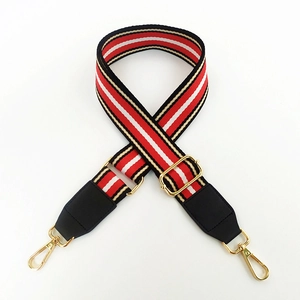 Bandoulière réglable en toile rayée avec embouts en cuir noir et boucles en métal doré