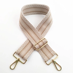 Adjustable wide woven shoulder strap with geometric embroidery and gold metal hooks