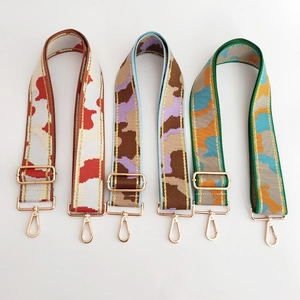 Three wide adjustable camouflage bag straps with gold metallic thread and lobster clasps