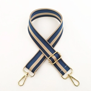 Adjustable wide striped canvas strap with gold hardware for crossbody bags and handbags