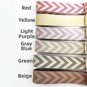 Close-up of woven bag straps in six colors with gold adjustable metal buckles