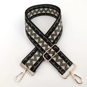 Adjustable wide replacement strap with green and black wavy pattern and gold hardware