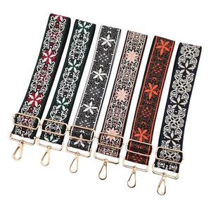 Detail of 6 bohemian embroidery wide straps with gold zinc alloy hardware and floral jacquard