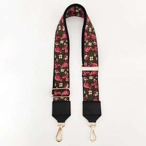 Detailed view of floral embroidery on wide ethnic style adjustable shoulder strap
