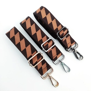 Adjustable wide guitar strap for bags with gold, silver and gunmetal hardware detail