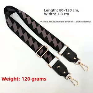 Detail of adjustable geometric strap with gold hooks, 3.8cm width and 80-130cm length