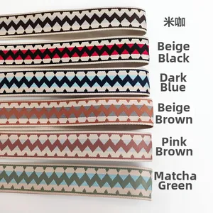 Detailed close-up of six ethnic wave pattern woven shoulder straps in vibrant colors