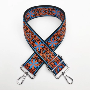 Detail of colorful ethnic embroidery on 5cm wide thick strap with silver lobster clasp