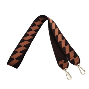 Adjustable woven replacement bag strap with brown geometric pattern and gold clasps