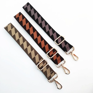 Adjustable wide replacement bag straps with geometric jacquard pattern and gold buckles