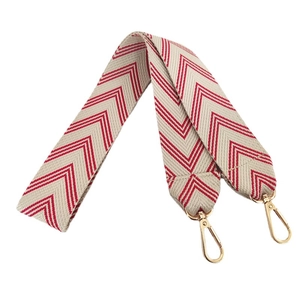 Thickened wide shoulder strap with red and cream geometric jacquard embroidery and gold clips