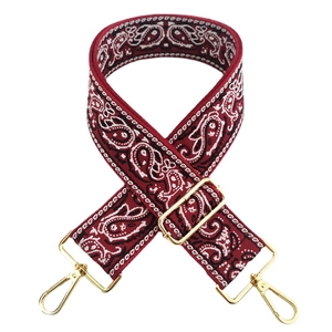 Ethnic paisley embroidered wide shoulder strap in burgundy with gold metal hooks