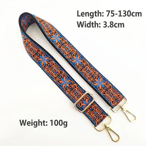Adjustable floral embroidered shoulder strap for bags with gold metal swivel hooks