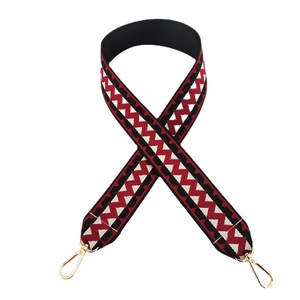 Ethnic wide woven shoulder strap with colorful geometric pattern and gold metal hooks