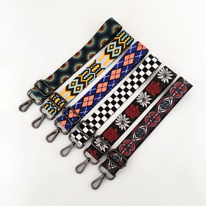 Ethnic wide bag straps set with floral and geometric patterns and metal buckles