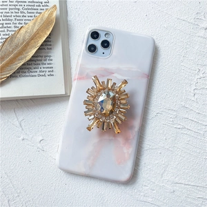 Weiße Marmor iPhone Hülle mit luxuriösem goldenem Kristall Edelstein Ringständer