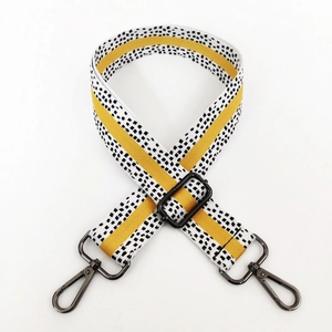 Verstellbarer Taschenriemen mit gelben Streifen, schwarzen Punkten und Metallkarabinerhaken