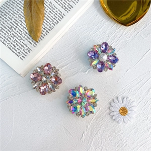Elegant crystal petal phone grip stand with diamond rhinestones and pearl inlay accents
