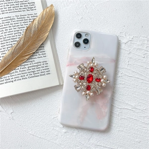 Supporto per telefono di lusso con perle e strass su custodia in marmo bianco elegante