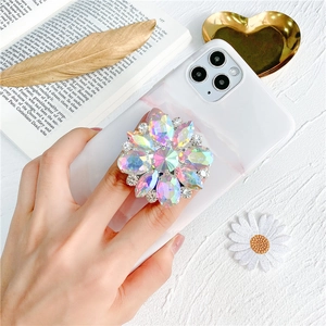 Sparkling crystal flower phone grip with colorful rhinestones on marble case