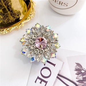 Luxury floral crystal phone grip with pink center stone and sparkling rhinestones