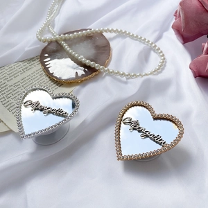 Luxury heart-shaped mirror phone grip with sparkling rhinestones and folding air cushion